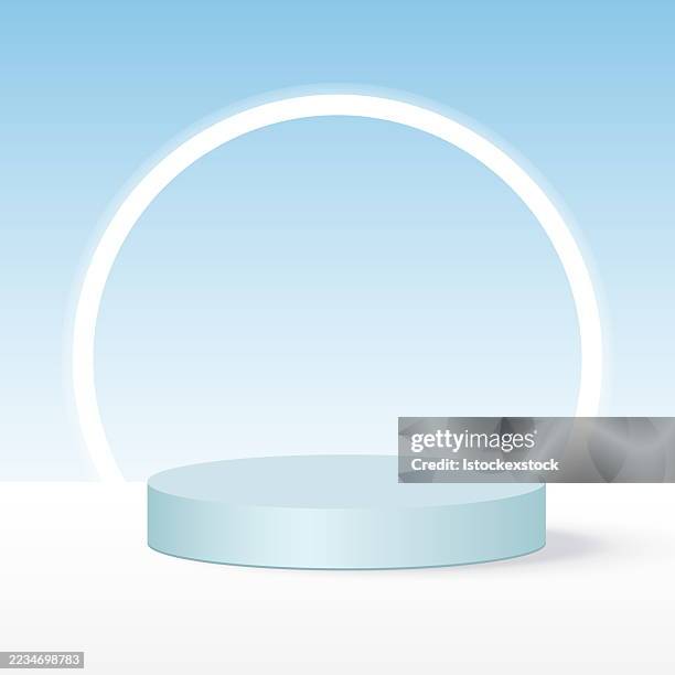 minimalist blue round podium with glowing ring on light background - empty window display stock illustrations