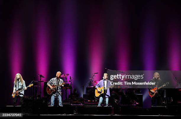 Timothy B. Schmit, Don Henley, Glenn Frey, and Joe Walsh of The Eagles perform part of the bands' Long Road Out of Eden Tour at Arco Arena on April...