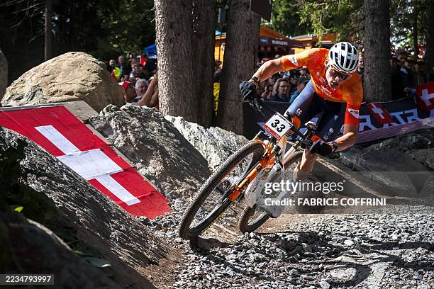 Netherlands' Mathieu van der Poel competes during the Men's elite Cross-country Olympic race as part of the 2025 UCI Mountain Bike World...
