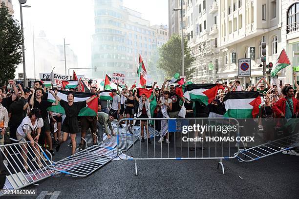Pro-Palestinians protestors invade the street during the 21st and last stage of the Vuelta a Espana 2025, a 101 km race between Alalpardo and Madrid,...