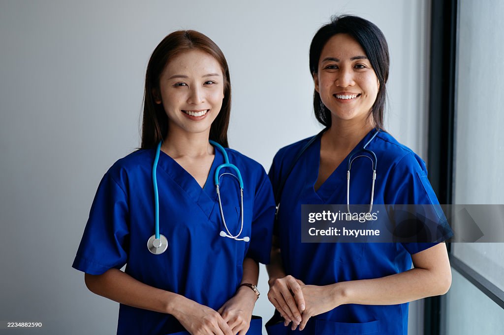 Portrait of Confident Female Healthcare Professionals in Scrubs