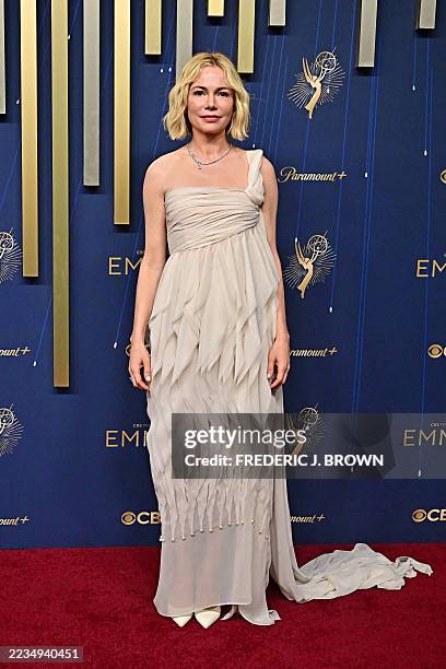 Actress Michelle Williams arrives for the 77th Primetime Emmy Awards at the Peacock Theatre at LA Live in Los Angeles on September 14, 2025. /...