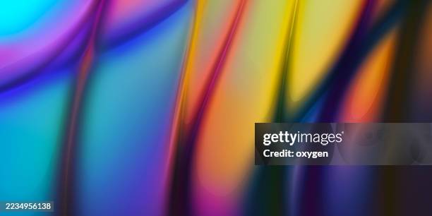 colorful abstract flow with vertical gradient streaks background. vivid abstract background featuring smooth vertical streaks in blue, yellow, orange, and purple hue - glatte oberfläche stock-fotos und bilder