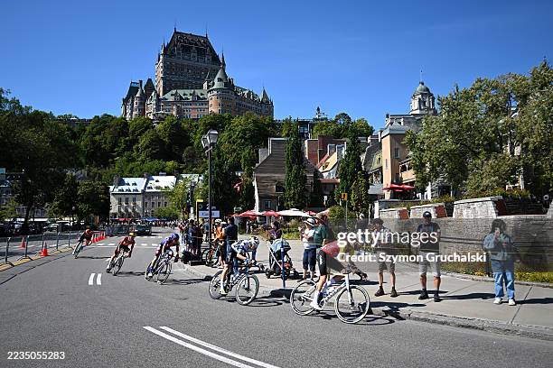 Nicolas Debeaumarche of France and Team Cofidis and a general view of the peloton competing with the Fairmont Le Chateau Frontenac Hotel in the...