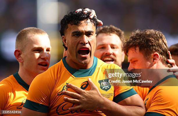 Joseph-Aukuso Suaalii of the Wallabies celebrates with teammates after scoring a try during The Rugby Championship match between Australia Wallabies...