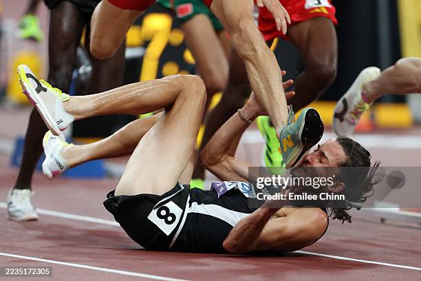 Geordie Beamish of Team New Zealand avoids the foot of Jean-Simon Desgagnes of Team Canada as he falls to the ground during the the Men's 3000 Metres...