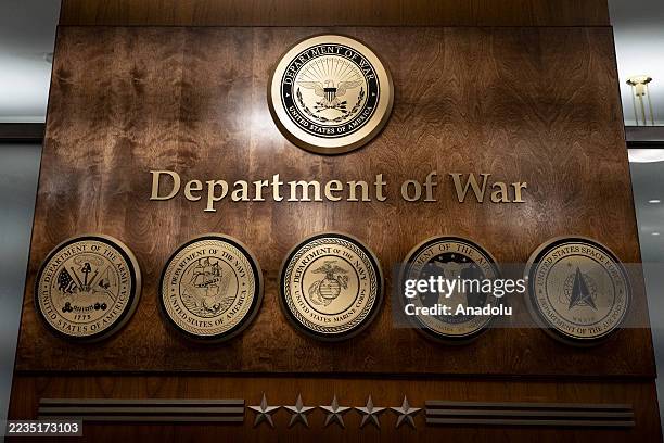 The New Department of War logo is seen after US President Donald Trump signed an order to rename the Department of Defense to the Department of War...