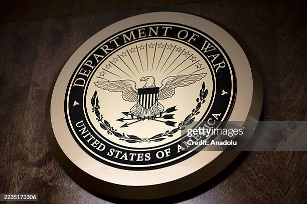 The New Department of War logo is seen after US President Donald Trump signed an order to rename the Department of Defense to the Department of War...