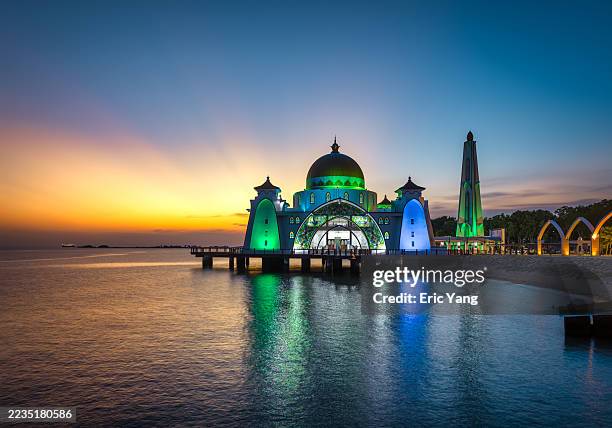 aerial view of masjid selat melaka at dusk, malacca, malaysia - malacca foto e immagini stock