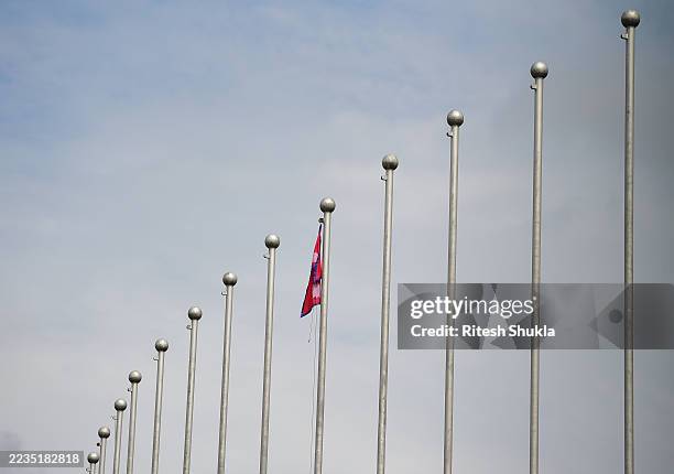 The national flag of Nepal is seen inside the burnt building of the Parliament house of Nepal during Monday's anti-corruption protests on September...