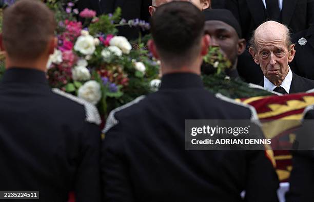 Britain's Prince Edward, Duke of Kent looks at the coffin of his late wife Katharine, Duchess of Kent, following a Requiem Mass, a Catholic funeral...