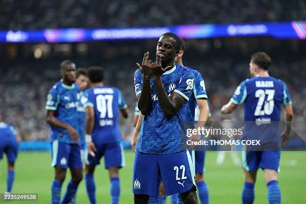 Marseille's US forward Tim Weah celebrates scoring his team's first goal during the UEFA Champions League first round day 1 football match between...