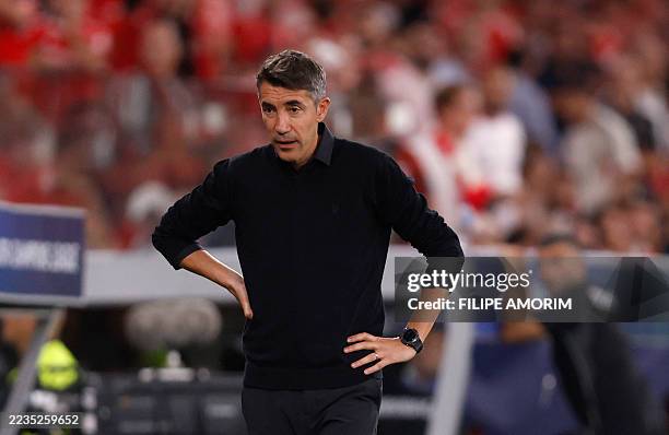 Benfica's Portuguese coach Bruno Lage reacts after his team conceded a third goal during the UEFA Champions League first round day 1 football match...