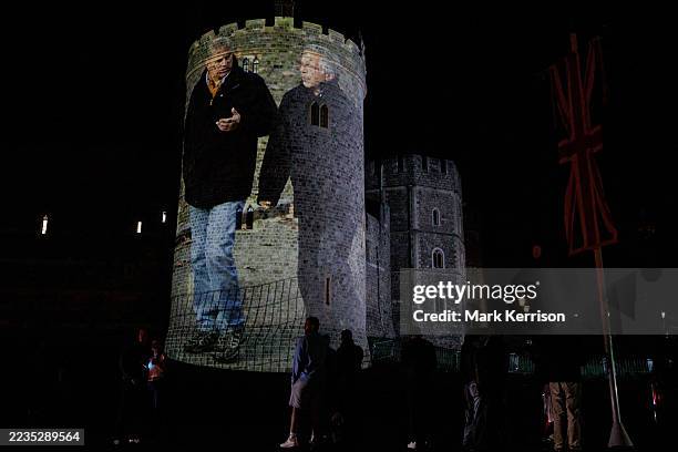 Political campaign group Led By Donkeys project an image of Prince Andrew and convicted paedophile Jeffrey Epstein onto Windsor Castle as US...