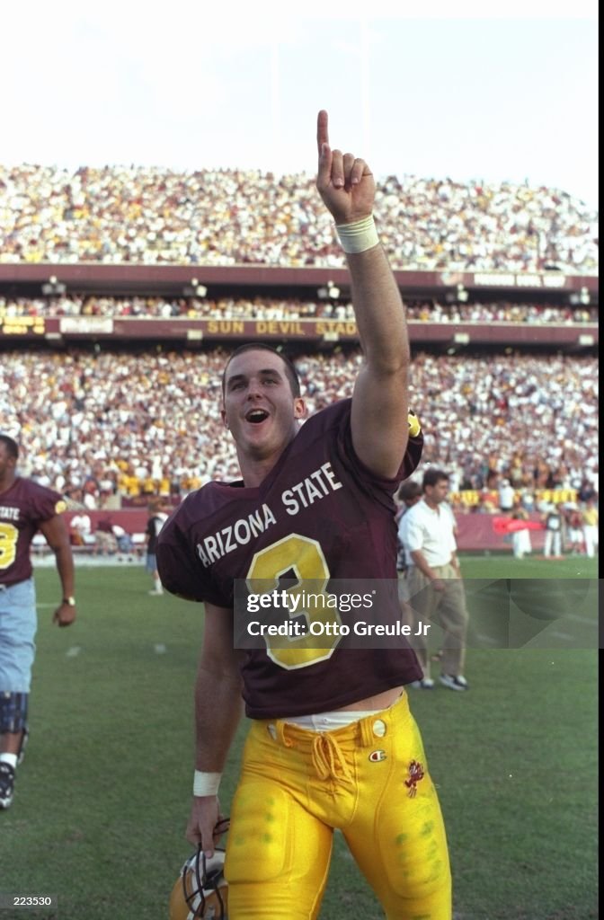 Keith Pool Wide receiver Keith Poole of the Arizona State Sun Devils raises his ...