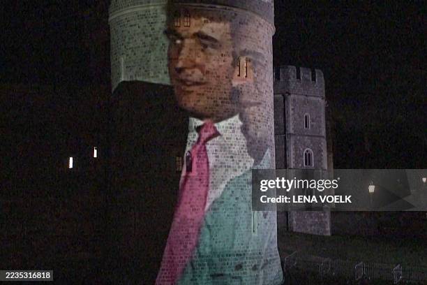 This frame grab made on September 17, 2025 from an AFP video footage dated from September 16, 2025 shows an image projected onto a tower of the...