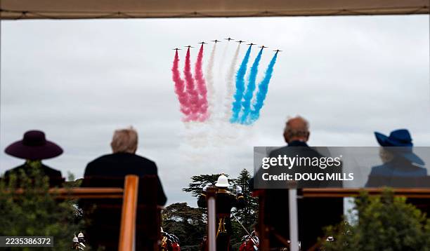 First Lady Melania Trump, US President Donald Trump, Britain's King Charles III and Britain's Queen Camilla, sit on the dias as The Royal Air Force...