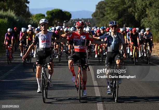 Joao Almeida of Portugal and UAE Team Emirates - XRG on second place, race winner Jonas Vingegaard of Denmark and Team Visma | Lease a Bike - Red...