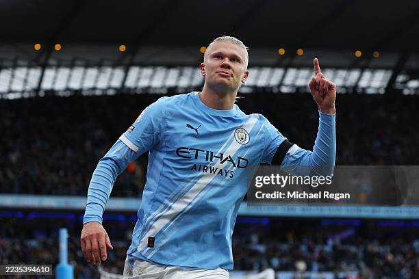 Erling Haaland of Manchester City celebrates scoring his team's second goal during the Premier League match between Manchester City and Manchester...