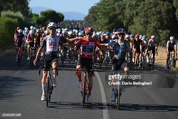Joao Almeida of Portugal and UAE Team Emirates - XRG on second place, race winner Jonas Vingegaard of Denmark and Team Visma | Lease a Bike - Red...