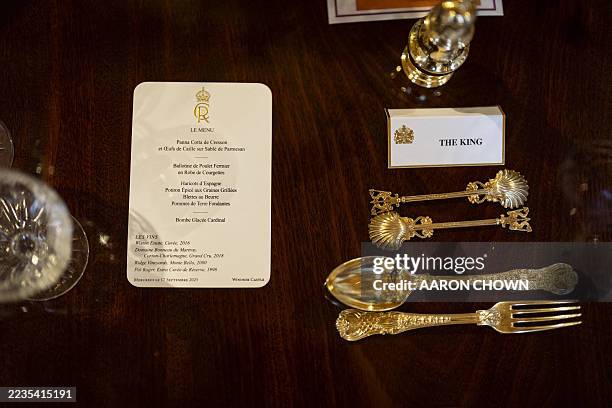 The place setting for Britain's King Charles III is pictured at the banquet table in St George's Hall where US President Donald Trump and US First...