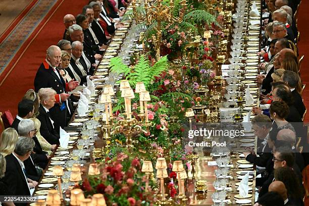 Britain's King Charles III stands beside US President Donald Trump to deliver a speech at the State Banquet at Windsor Castle for the State visit by...
