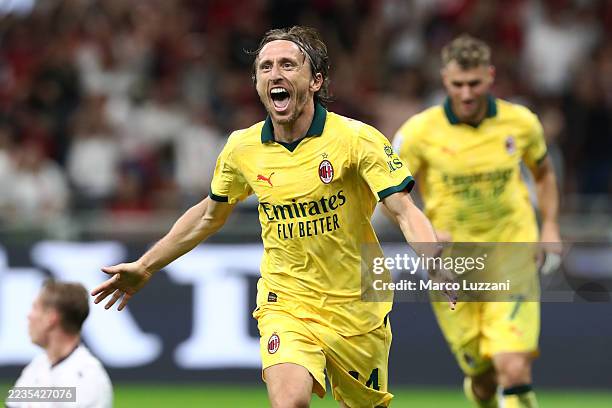 Luka Modric of AC Milan celebrates scoring his team's first goal during the Serie A match between AC Milan and Bologna FC 1909 at Giuseppe Meazza...
