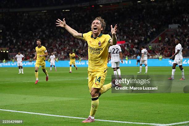 Luka Modric of AC Milan celebrates scoring his team's first goal during the Serie A match between AC Milan and Bologna FC 1909 at Giuseppe Meazza...