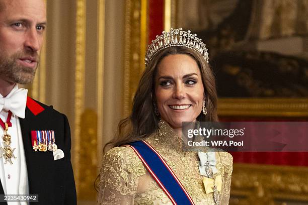 Catherine, Princess of Wales and Prince William, Prince of Wales arrive for the State Banquet hosted by King Charles III and members of the Royal...