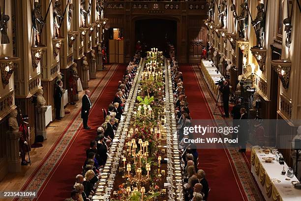 King Charles III gives a speech at the State Banquet hosted by King Charles III and members of the Royal Family at Windsor Castle during the state...