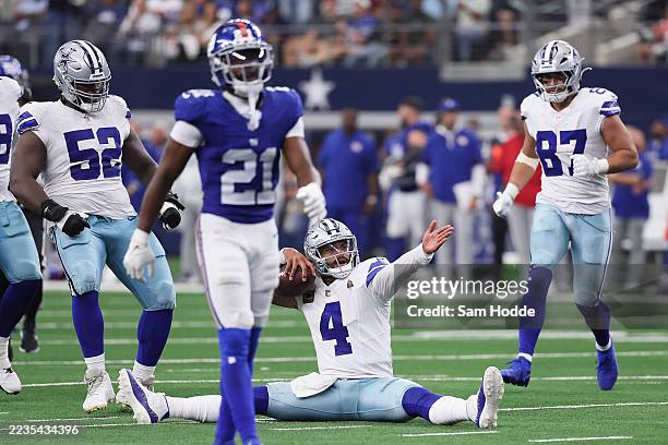 Dak Prescott of the Dallas Cowboys reacts after sliding into field goal range during overtime in the game against the New York Giants at AT&T Stadium...