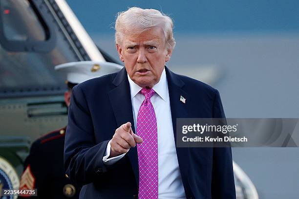 President Donald Trump walks to Air Force One at Morristown Airport on September 14, 2025 in Morristown, New Jersey. Trump is returning to...