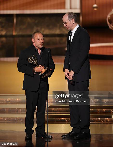 Stephen Graham and Jack Thorne accept the Outstanding Writing for a Limited or Anthology Series or Movie award for "Adolescence" speaks onstage...