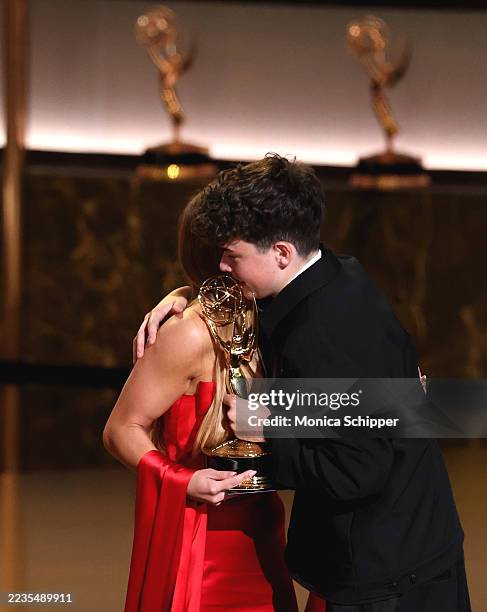Sydney Sweeney presents the Outstanding Supporting Actor in a Limited or Anthology Series or Movie award for "Adolescence" to Owen Cooper onstage...