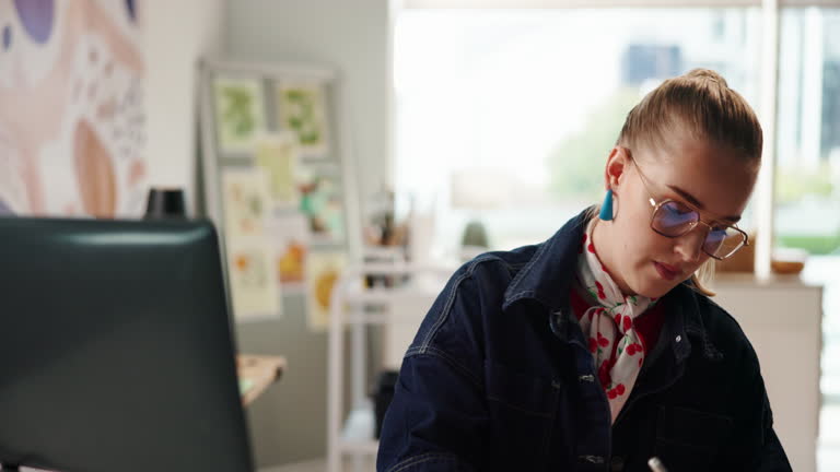 https://media.gettyimages.com/id/2235582586/video/writing-woman-and-employee-with-laptop-home-office-or-planning-for-web-design-creative-or.jpg?b=1&s=640x640&k=20&c=FjGhr214XNoooja49wrHRkjcNg1yXMpr5vodM2ZOoX8=
