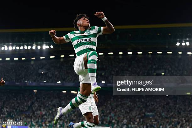 Sporting Lisbon's Brazilian forward Alisson Santos celebrates after scoring their third goal during the UEFA Champions League first round day 1...
