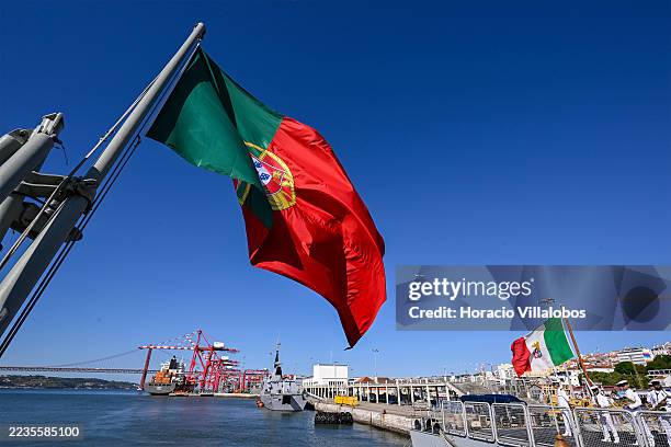 Portuguese and Italian flags flutter on the frigate NRP D. Francisco de Almeida and Italian offshore patrol vessel Paolo Thaon di Revel during the...