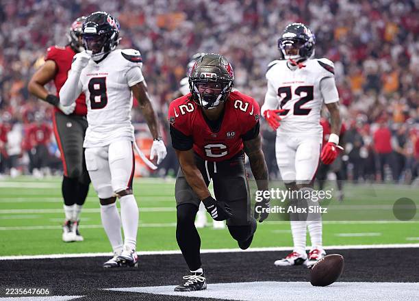 Emeka Egbuka of the Tampa Bay Buccaneers celebrates after scoring a 15 yard touchdown against the Houston Texans during the second quarter in the...