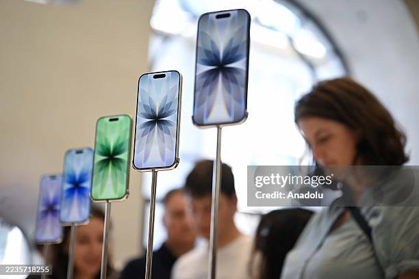 IPhone 17 on display as customers look at products during the Apple's new iPhone sales launch at the Apple Store on Regent Street in London, United...