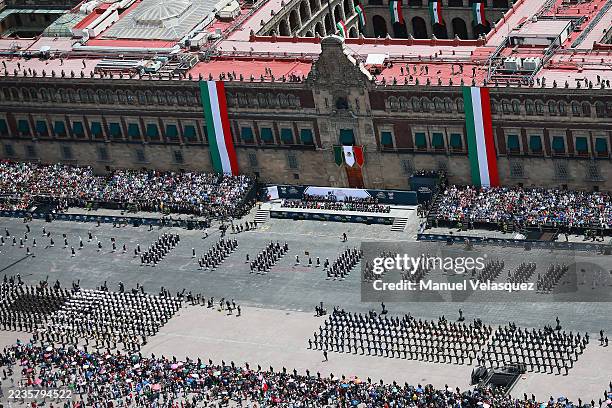 In this aerial view, the military parade walks past the Palacio Nacional during the Independence Day military parade at Zocalo on September 16, 2025...