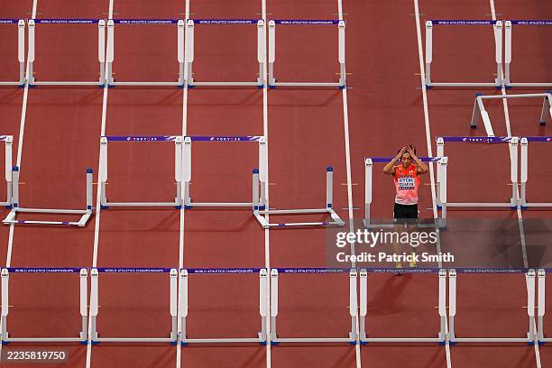 Shunsuke Izumiya of Team Japan reacts after falling during the Men's 110 Metres Hurdles Semi-Finals on day four of the World Athletics Championships...