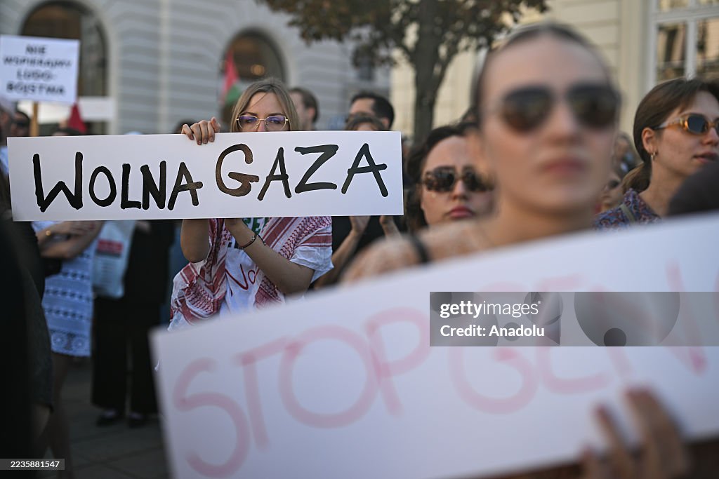 Stop Protest People hold banners as they protest the government inaction to stop ...