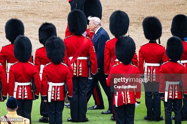 President Donald Trump inspects troops at the Ceremonial Welcome during the State visit by the President of the United States of America at Windsor...