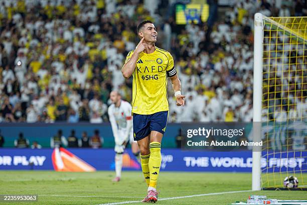Cristiano Ronaldo of Team Al-Nassr FC celebrates scoring their fifth goal during the Saudi Pro League match between Al Nassr and Al Riyadh at Al...