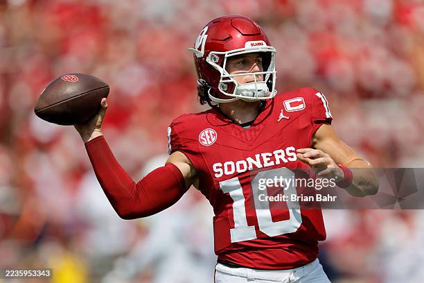 Quarterback John Mateer of the Oklahoma Sooners throws a pass before a game against the Auburn Tigers at Gaylord Family Oklahoma Memorial Stadium on...