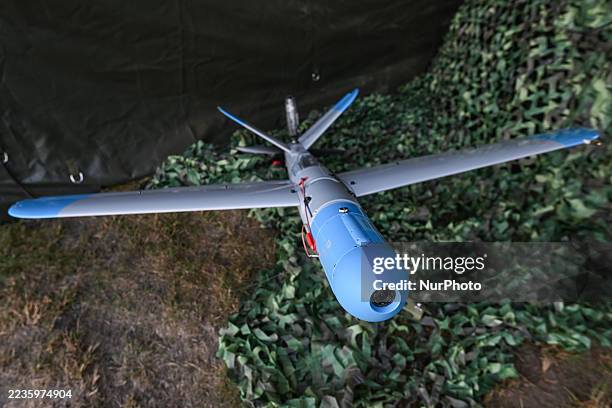 The WB Electronics Warmate, a loitering munition UAV developed by the Polish defense contractor WB Group, is on display at the Nowa Deba training...