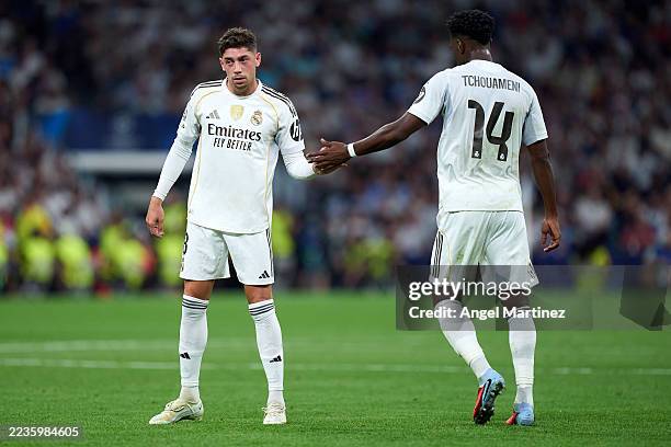 Federico Valverde and Aurelien Tchouameni of Real Madrid shake hands during the UEFA Champions League 2025/26 League Phase MD1 match between Real...