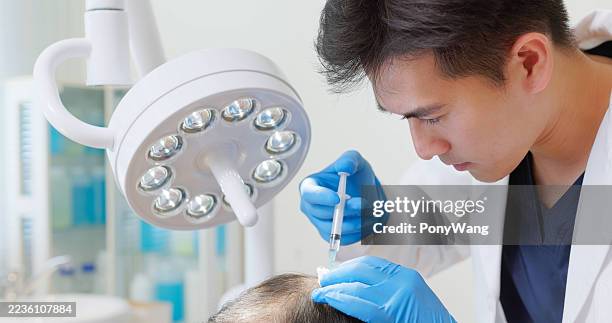 scalp injection on bald man - hairline polished metal stock pictures, royalty-free photos & images