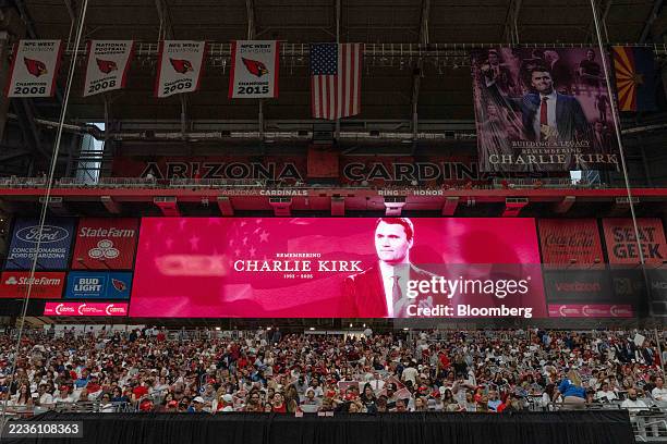 An image of Turning Point USA founder Charlie Kirk displayed ahead of a memorial service at State Farm Stadium in Glendale, Arizona, US, on Sunday,...