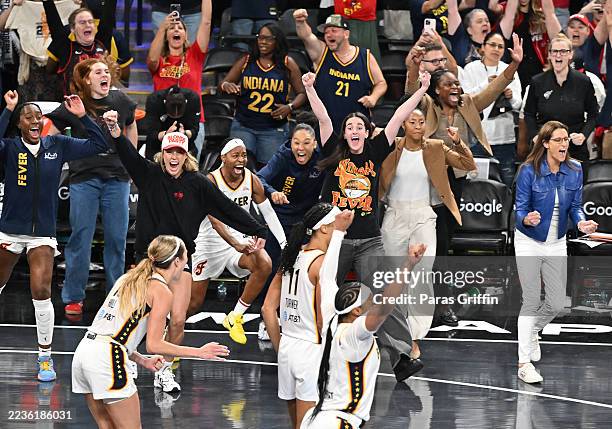 Indiana Fever bench and Head Coach Stephanie White of the Indiana Fever celebrate against Atlanta Dream during fourth quarter at game three of the...